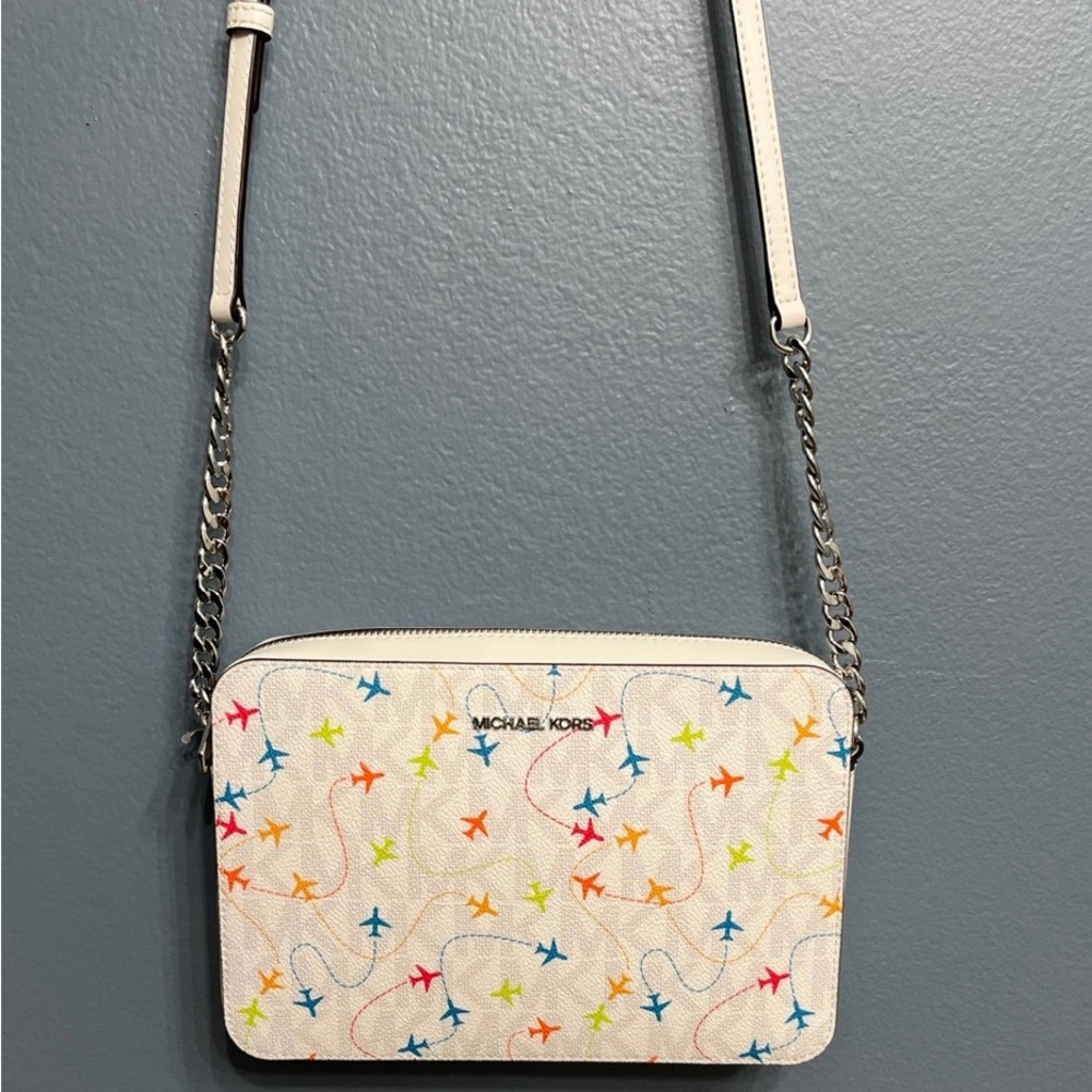 Michael Kors, Jet Set, airplane Crossbody purse white. Rare
